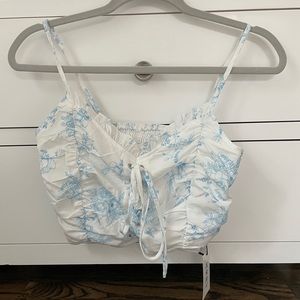 White crop top with blue floral print